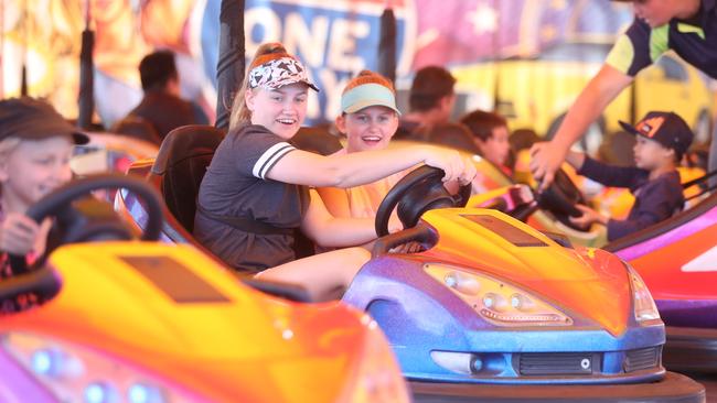 Keely Harris and Matilda Harris on the dodgem cars. Photo by Richard Gosling