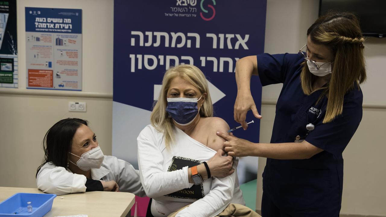 Israel has started giving fourth Covid vaccine shots to people over 60 and health workers amid a surge driven by the Omicron variant (Photo by Amir Levy/Getty Images)