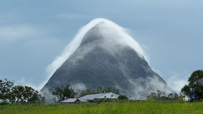 Mt Beerwah covered by fog. Picture: Billy Tillott