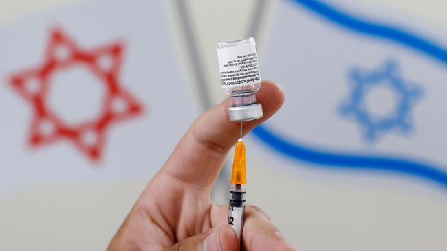 An Israeli medical worker prepares a dose of the Pfizer/BioNTech Covid-19 vaccine.