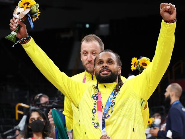 SAITAMA, JAPAN - AUGUST 07: Patty Mills of Team Australia celebrates with his bronze medal during the Men's Basketball medal ceremony on day fifteen of the Tokyo 2020 Olympic Games at Saitama Super Arena on August 07, 2021 in Saitama, Japan. (Photo by Kevin C. Cox/Getty Images)