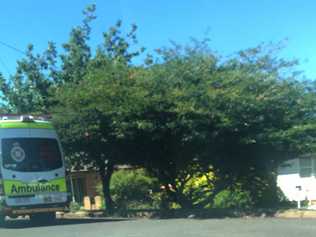 The ambulance out the front of Doris Symes house. . Picture: QAS