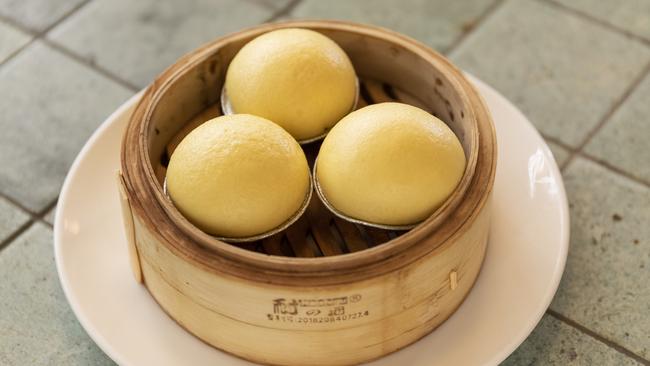 Salted egg lava custard buns. Picture: Mark Cranitch.