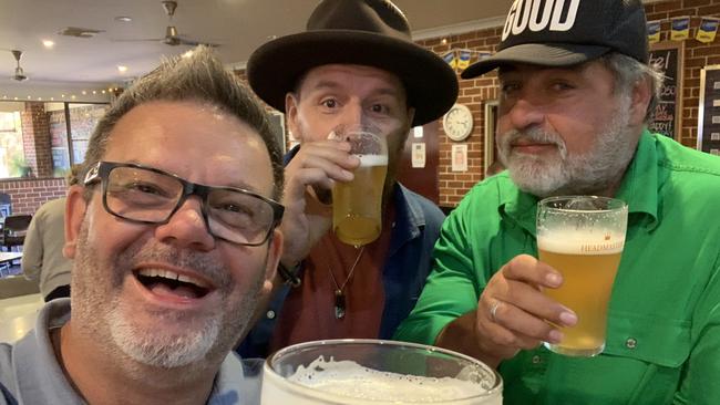 Here’s cheers: Gary Mehigan, Manu Feildel and Matt Preston at the Cobargo Pub on their #emptyesky roadtrip, summer 2020