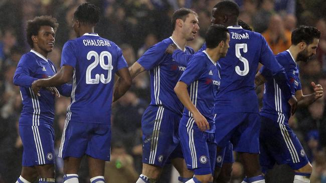 Chelsea's Willian, left, celebrates after scoring his side's third goal.