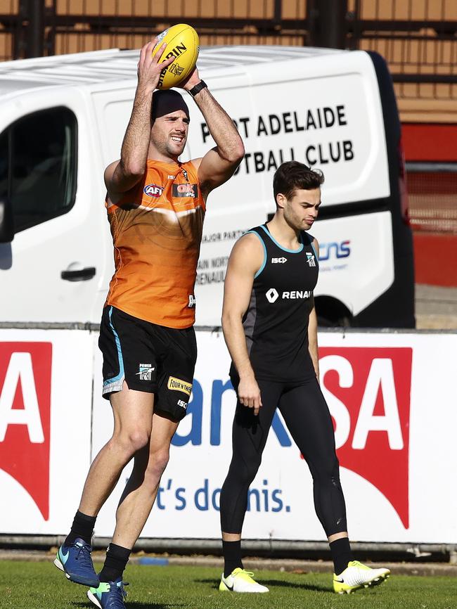 Port Adelaide’s Mathew Broadbent and Karl Amon train yesterday. Picture: Sarah Reed