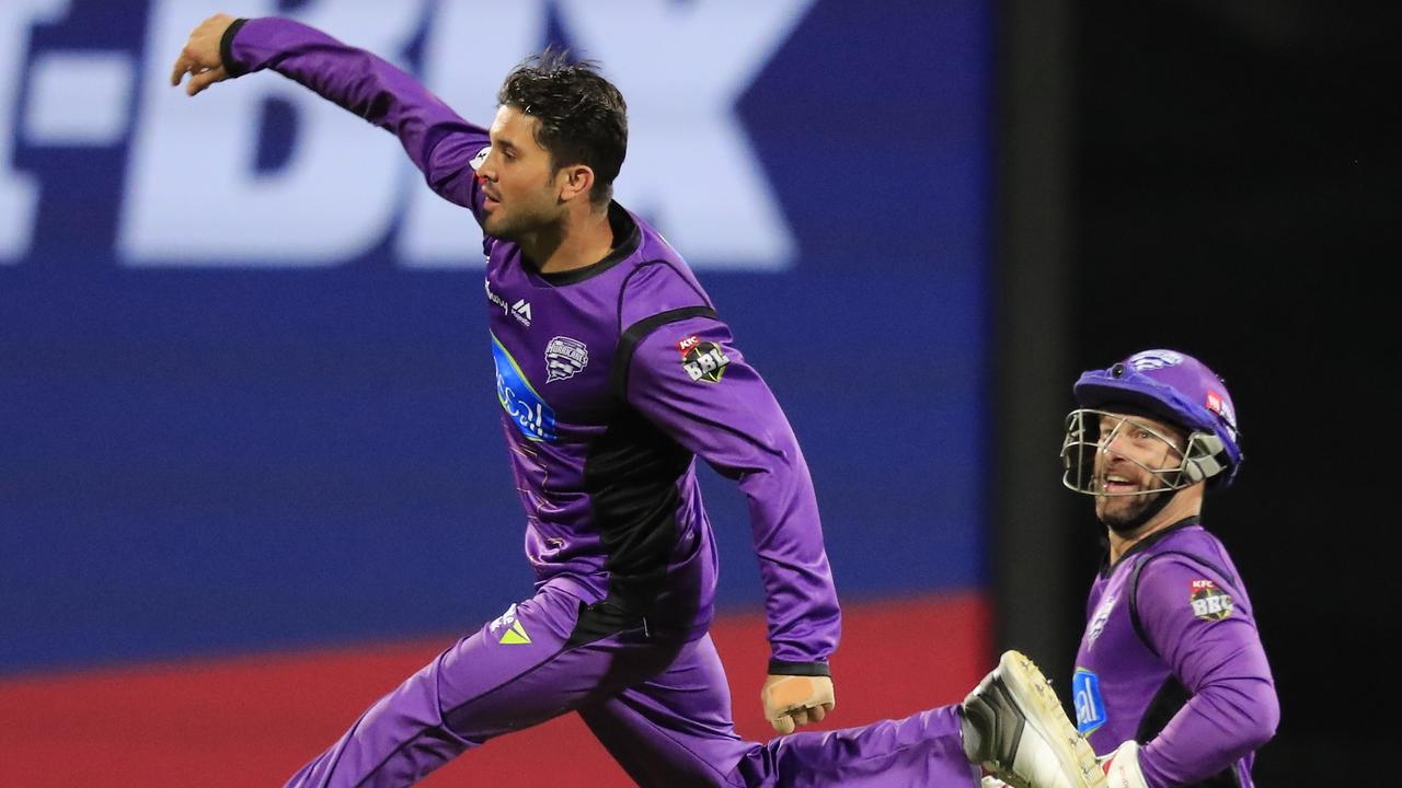 Qais Ahmad jumps for joy after snaring a wicket for Hobart Hurricanes last season.