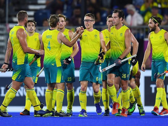 Australia's Matthew Dawson (C) celebrates with teammates