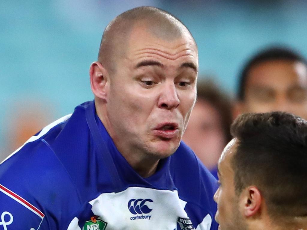 SYDNEY, AUSTRALIA - JULY 27:  Luke Brooks of the Tigers tackles David Klemmer of the Bulldogs during the round 20 NRL match between the Canterbury Bulldogs and the Wests Tigers at ANZ Stadium on July 27, 2018 in Sydney, Australia.  (Photo by Cameron Spencer/Getty Images)