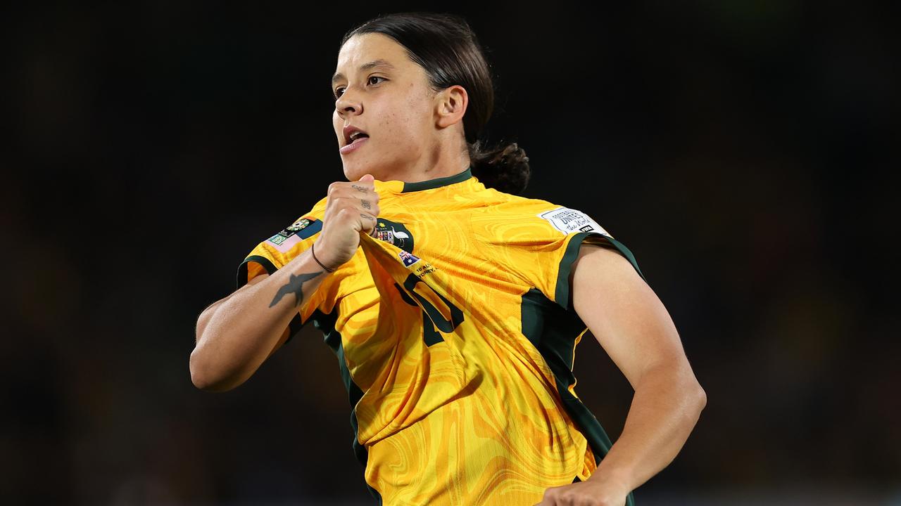 SYDNEY, AUSTRALIA - AUGUST 16: Sam Kerr of Australia celebrates after scoring her team's first goal during the FIFA Women's World Cup Australia &amp; New Zealand 2023 Semi Final match between Australia and England at Stadium Australia on August 16, 2023 in Sydney, Australia. (Photo by Brendon Thorne/Getty Images)