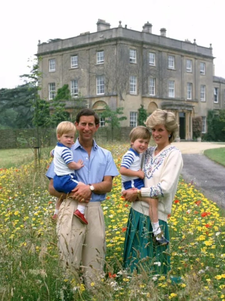 Charles and Princess Diana pose with their sons Prince Williams and Prince Harry in the wildflower meadow at Highgrove on July 14,1986. Picture: Getty