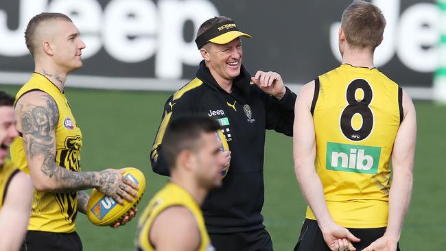 Tigers coach Damien Hardwick has a laugh with Jack Riewoldt. Pic: Michael Klein