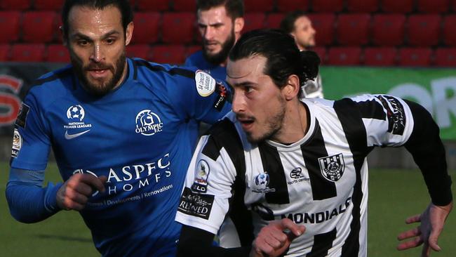 Adelaide City’s Evan Kostopoulos and former Olympic midfielder Ricardo Da Silva.