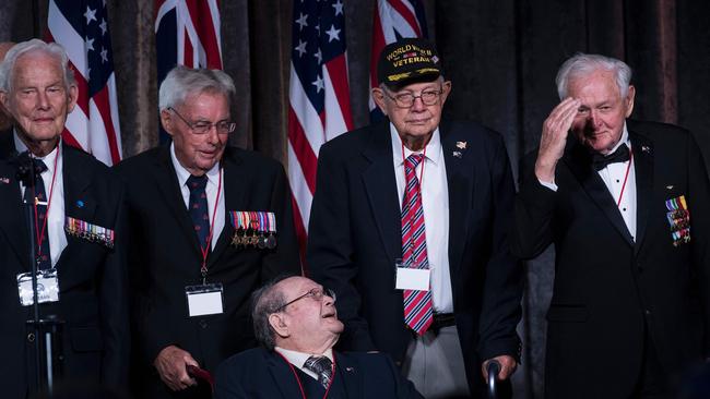 Veterans are celebrated during a dinner to commemorate the 75th anniversary of the Battle of the Coral Sea during WWII, attended by US President Donald Trump and Australia's Malcolm Turnbull,. Picture: AFP