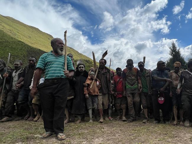 Village leaders ready to accept a delivery. Picture: ADF.