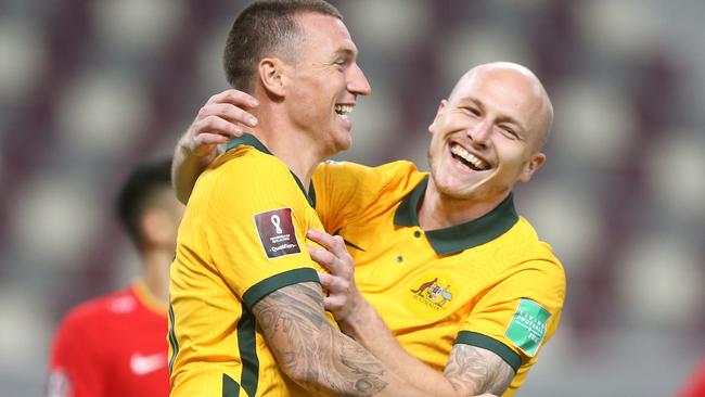 DOHA, QATAR - SEPTEMBER 02: Mitchell Duke of Australia  celebrates after scoring their team's third goal during the 2022 FIFA World Cup Qualifier match between Australia and China PR at Khalifa International Stadium on September 02, 2021 in Doha, Qatar. (Photo by Mohamed Farag/Getty Images)