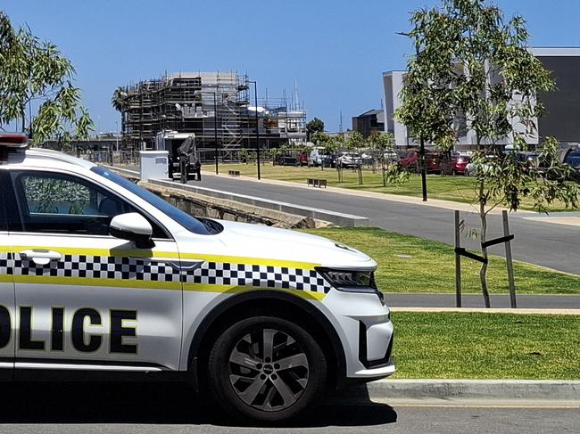 About five SA Police officers including members of the Water Operations Unit, remained at scene where a body was discovered at New Port on Tuesday afternoon.