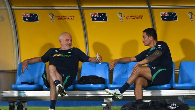 Arnold and Socceroos legend Tim Cahill at a World Cup training session in Doha, Qatar. (Photo by Dan Mullan/Getty Images)