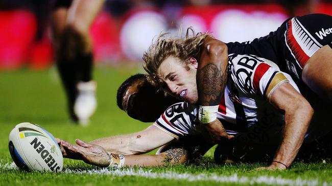 AUCKLAND, NEW ZEALAND - JUNE 13: Brendan Elliot of the Roosters scores a try during the round 14 NRL match between the New Zealand Warriors and the Sydney Roosters at Mt Smart Stadium on June 13, 2015 in Auckland, New Zealand. (Photo by Anthony Au-Yeung/Getty Images)
