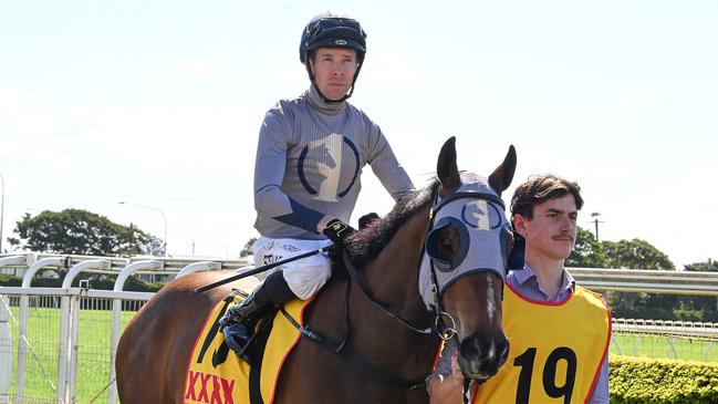 Ronnie Stewart rounds out a winning double at Doomben aboard Hell. Picture: Grant Peters/Trackside Photography