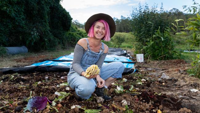 Alice Star from Loop Growers at Draper in her compost heap. Picture: Dominika Lis