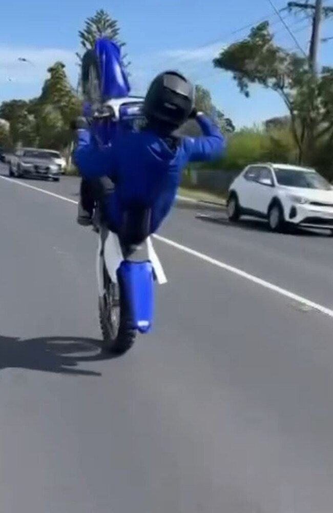 A hoon performing a wheelie for hundreds of metres in the face of oncoming traffic. Picture: Instagram/melbourne_hittas