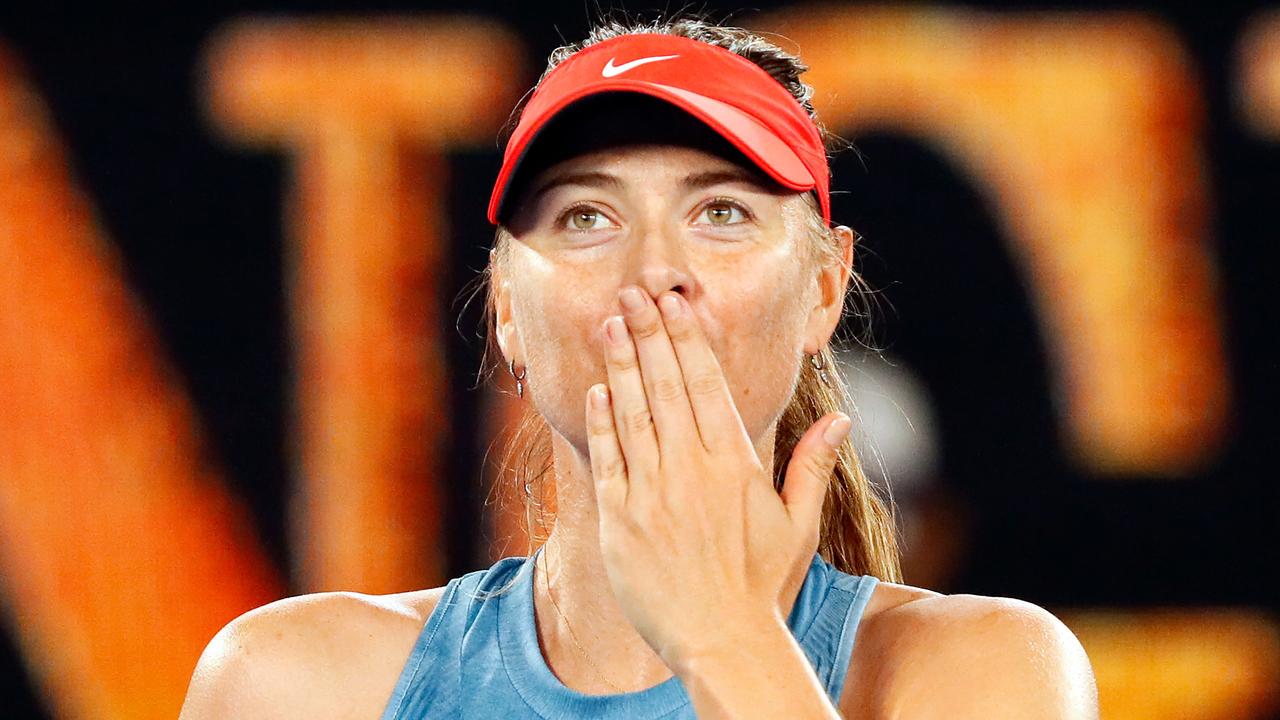 Russia's Maria Sharapova celebrates her victory against Denmark's Caroline Wozniacki.