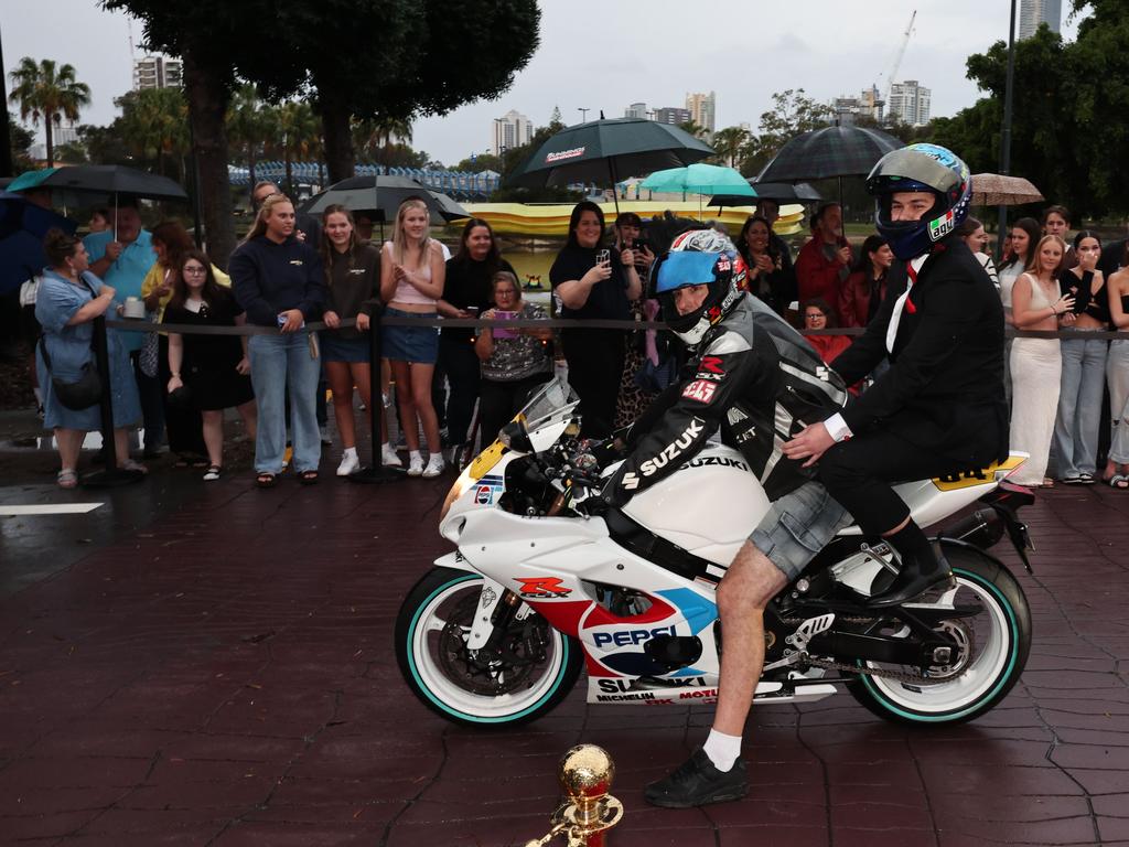 Students arrive for Robina State High formal at HOTA. Alexavier Stromer arrives by bike. Picture: Glenn Hampson.