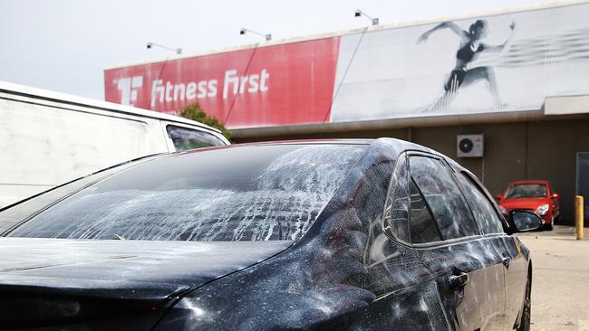 A car dusted for finger prints in the carpark near Fitness First, Rockdale, where Hawi was shot and later died.