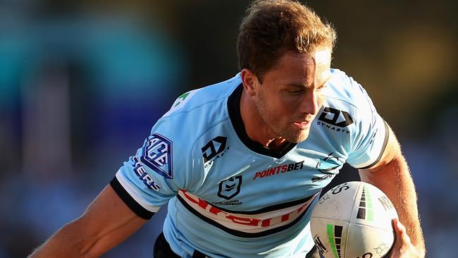 SYDNEY, AUSTRALIA – MAY 08: Matt Moylan of the Sharks is tackled during the round nine NRL match between the Cronulla Sharks and the New Zealand Warriors at PointsBet Stadium, on May 08, 2022, in Sydney, Australia. (Photo by Cameron Spencer/Getty Images)