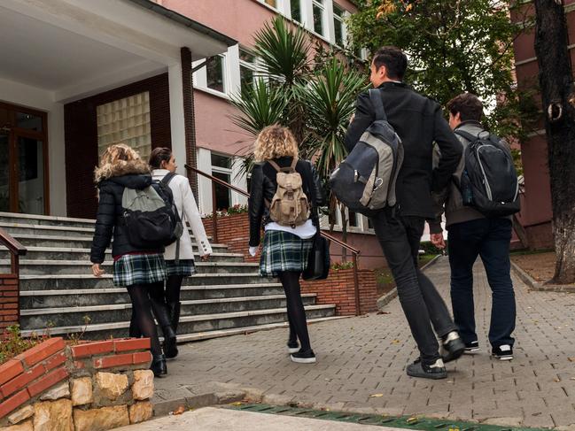 Turkish students walking to school. Cold autumnal morning. Nikon D3x, full frame, XXXL.