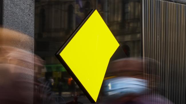 MELBOURNE, AUSTRALIA - MAY 03: People are seen walking past a Commonwealth Bank of Australia branch on May 03, 2022 in Melbourne, Australia. The Reserve Bank of Australia has today lifted the official interest rate to 0.35 per cent following a meeting today. The rise is the first interest rate increase since November 2010. (Photo by Asanka Ratnayake/Getty Images)