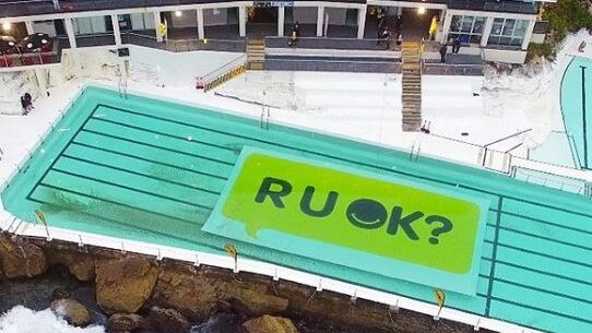 While supportive gestures, such as this at Bondi Icebergs, are nice, more needs to be done to tackle suicide and depression. Picture: Supplied