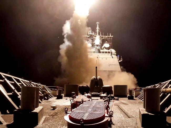 A cruise missile being fired from the Ticonderoga-class guided-missile cruiser USS Gettysburg (CG 64) at sea during operations against Yemen's Houthis. Picture: AFP