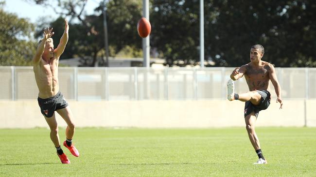 Sydney Swans players Isaac Heeney and James Bell train at Lakeside Oval in Sydney last week. Picture: Getty Images