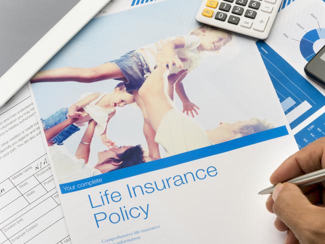 Life insurance brochure with family image and paperwork. life insurance generic, family protection