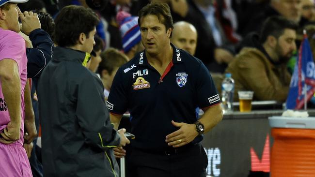 Luke Beveridge on the bench after the Bulldogs were ravaged by injury.