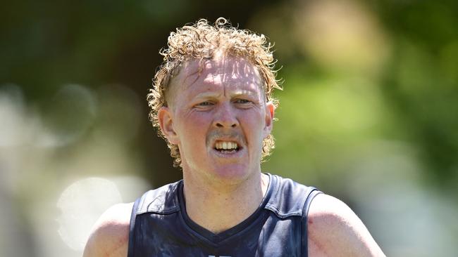 MELBOURNE, AUSTRALIA - NOVEMBER 22: Clayton Oliver of the Demons runs laps during a Melbourne Demons AFL training session at Gosch's Paddock on November 22, 2024 in Melbourne, Australia.  (Photo by Quinn Rooney/Getty Images)