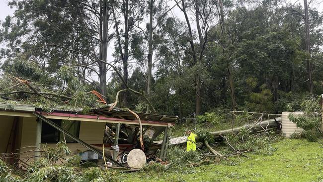 A house has been crushed by a tree at Currumbin Valley. Picture: Qld Ambulance Service, Facebook.