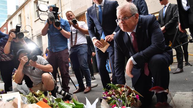 Prime Minister Scott Morrison visits Pellegrini’s Espresso Bar following its reopening on Tuesday morning. Picture: Jake Nowakowski