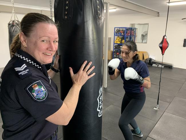 Senior Constable Catriona Burnett and boxing trainer Jessica Cashman are encouraging women who have experienced domestic violence to join free fitness classes at the Ipswich or Fernvale PCYC.