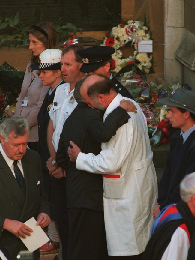 Port Arthur shooting massacre. Prime Minister John Howard embracing Hobart Hospital emergency department specialist Dr Bryan Walpole.