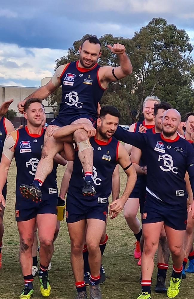 George Angelopoulos is carried from the ground after his 250th senior match. Pic: Steve Aitken World of Photography.