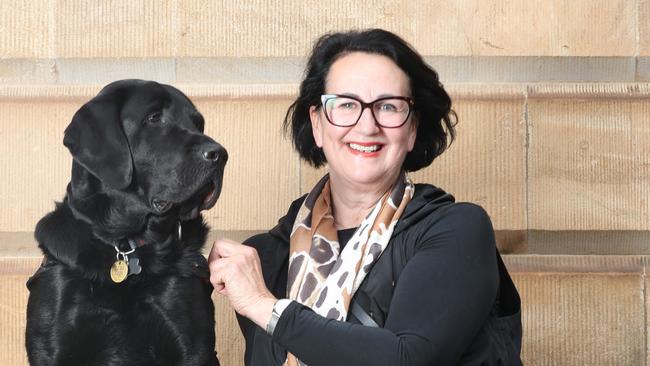 Attorney-General Vickie Chapman with Zero, SA’s inaugural canine court companion at the Adelaide Supreme court. Photo: Tait Schmaal.