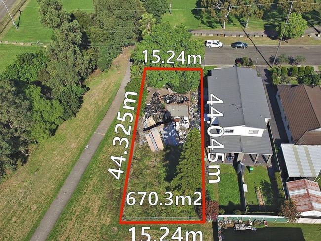 This burnt down home at 7 Bright Street, Guildford, NSW goes to auction in late November.