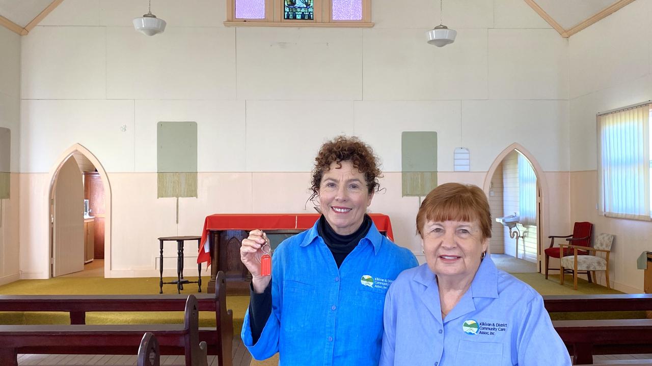 Kilkivan and District Community Care president Rosie Fitzgerald (left) with treasurer Lyn Sempf holding the keys to the historic St Kevin’s church at Kilkivan.