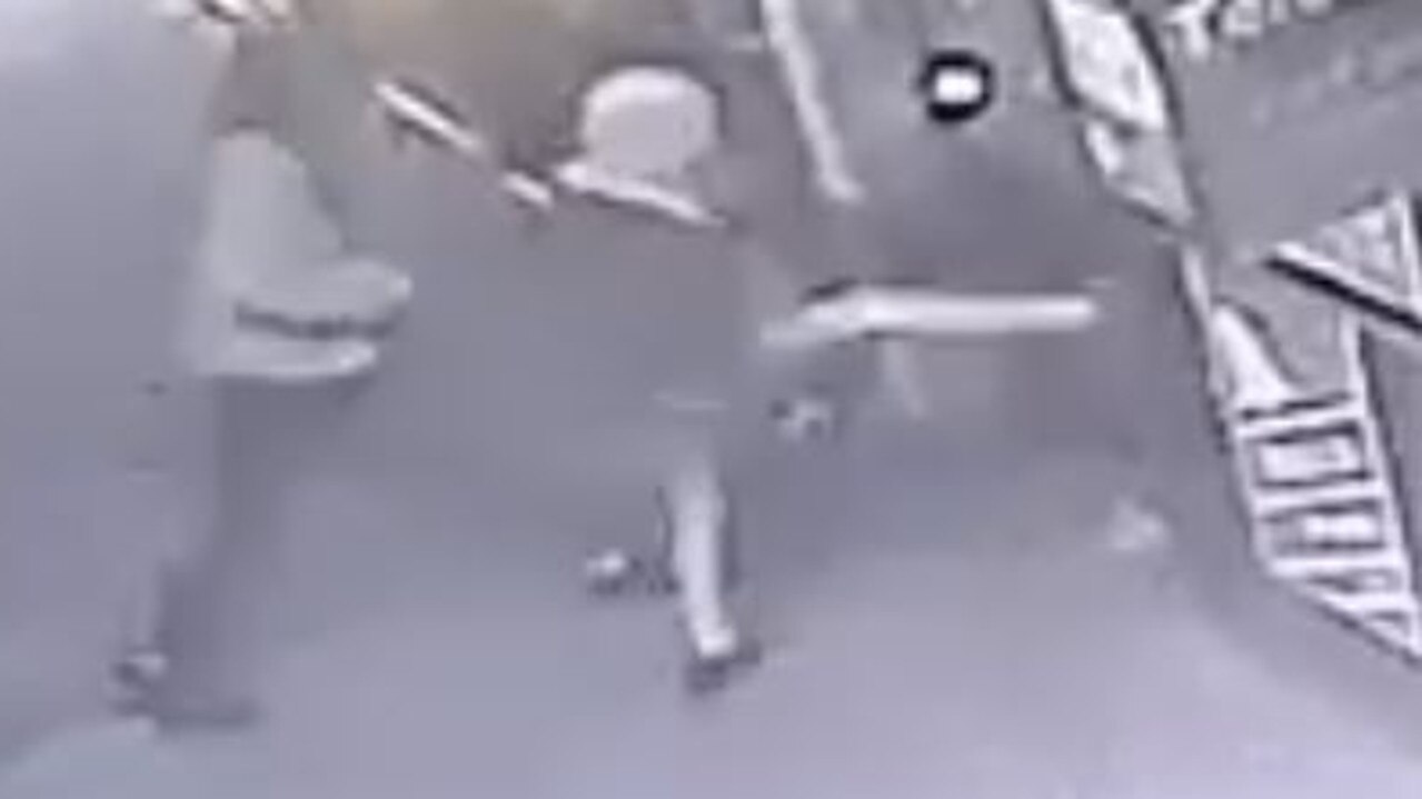 Youths attempt to break into a Palm Beach business.