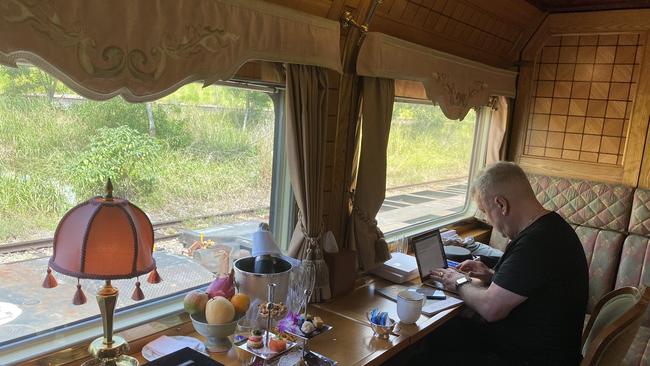 Barnes writing on the Eastern Oriental Express before he and wife Jane had to curtail their holiday and come home to self-isolate. Picture: Twitter