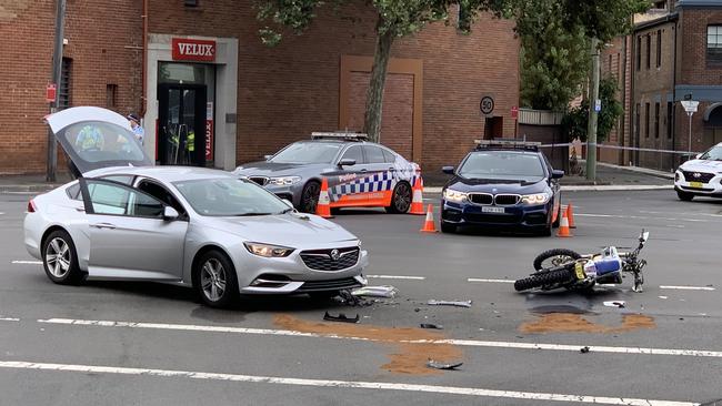 An unmarked police car and motorbike have collided in inner-city Sydney. Picture: Julian Andrews