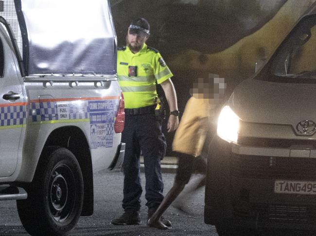 ## Please Note Faces are Blurred ##  20/01/2023: A young Indigenous Australian is released from a police cage truck and enters a local youth organisation vehicle to be returned to a ÃŒ?town campÃŒ? in Alice Springs. Picture: Liam Mendes / The Australian